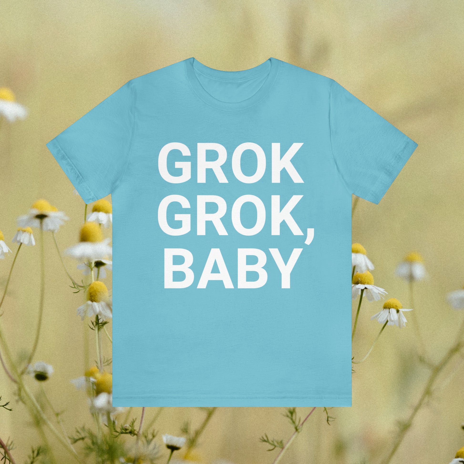 Light blue tee with "Grok Grok, Baby!"