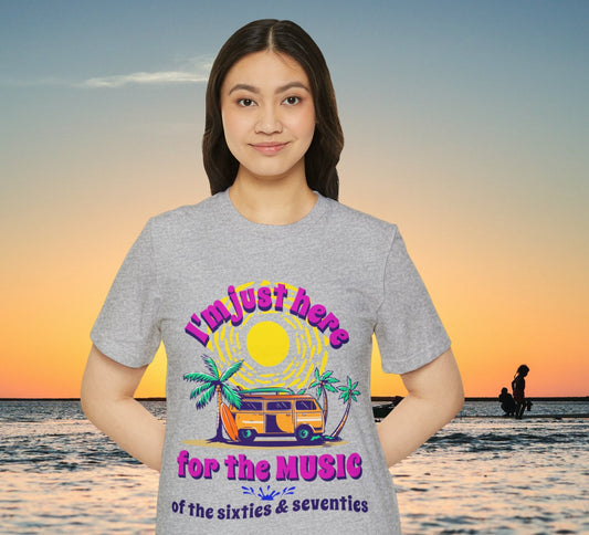 Young woman wearing graphic tee with beach background