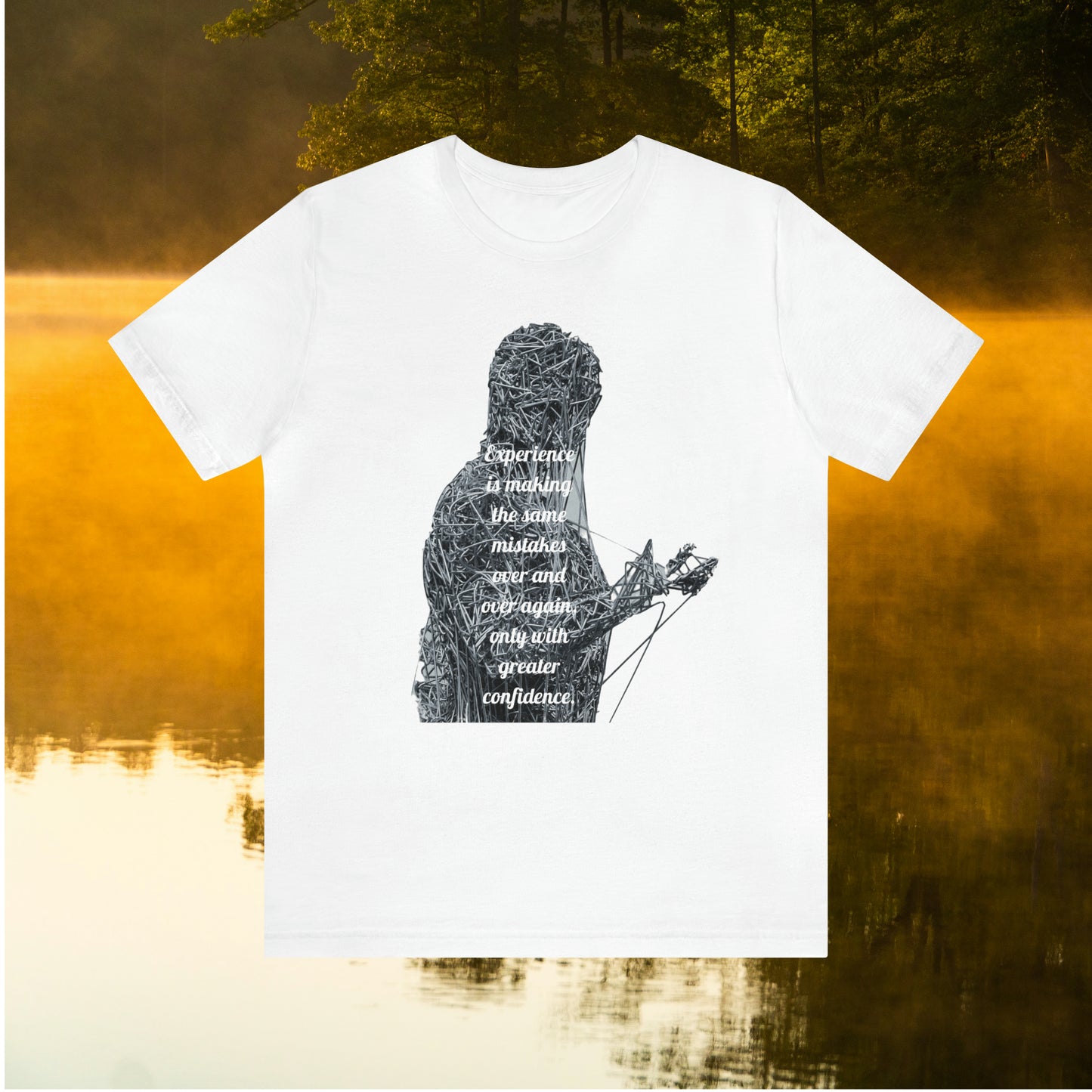 White  tee on golden pond background with "Experience is making the same mistakes" monster graphic