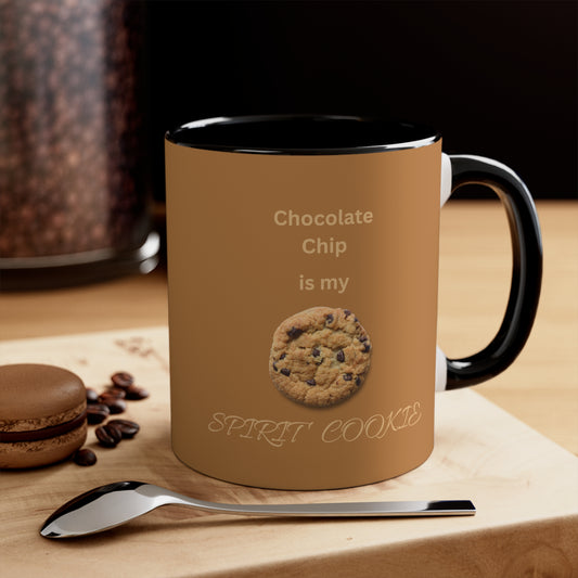 Cup with "Chocolate Chip is my Spirit Cookie" on a milk chocolate background, sitting on a table.