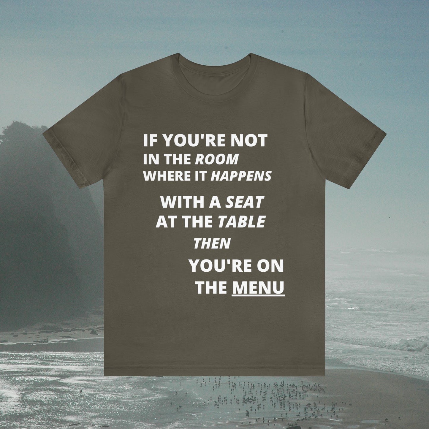 San tee with graphic "If you're not in the room...", foggy seashore background.