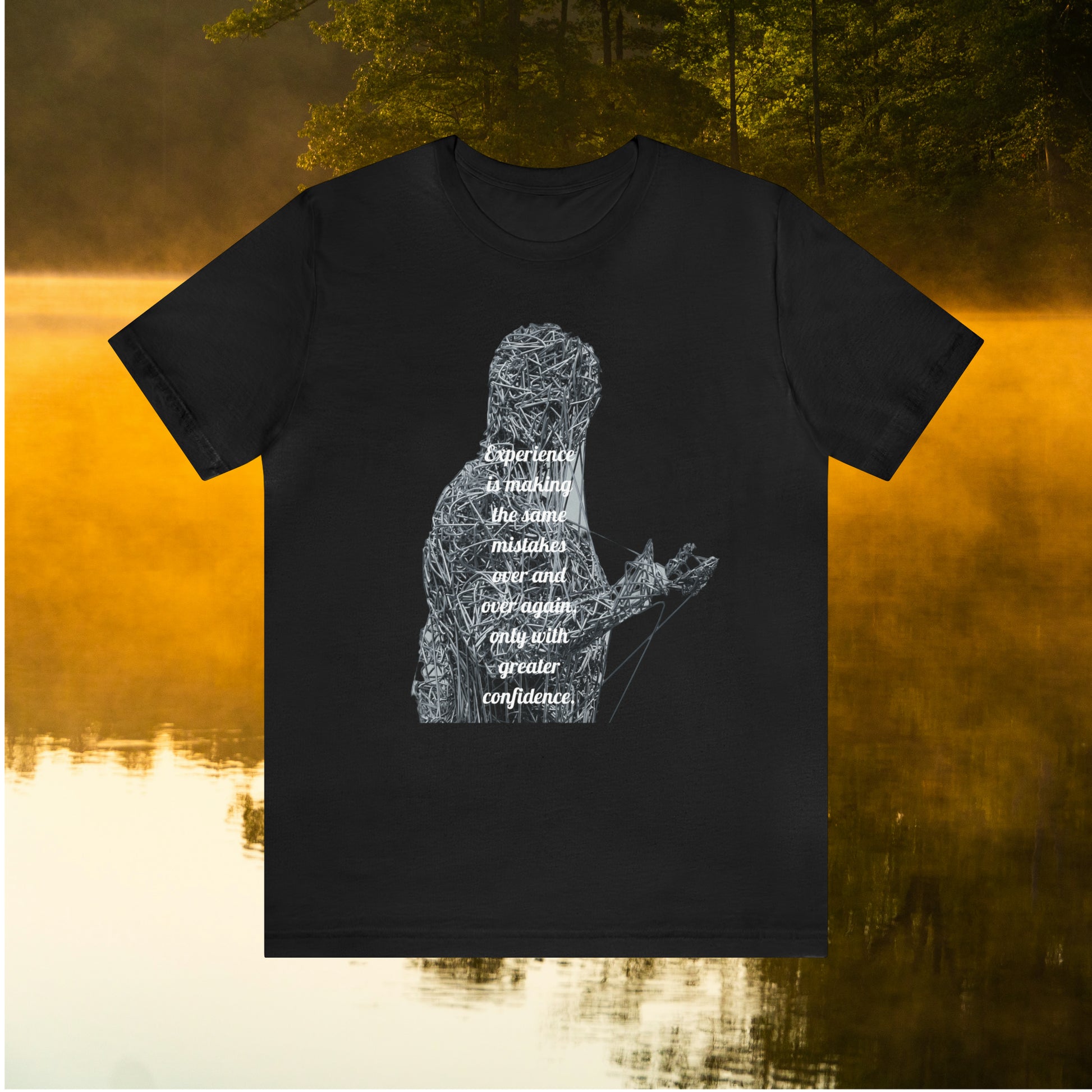 Black  tee on golden pond background with "Experience is making the same mistakes" monster graphic