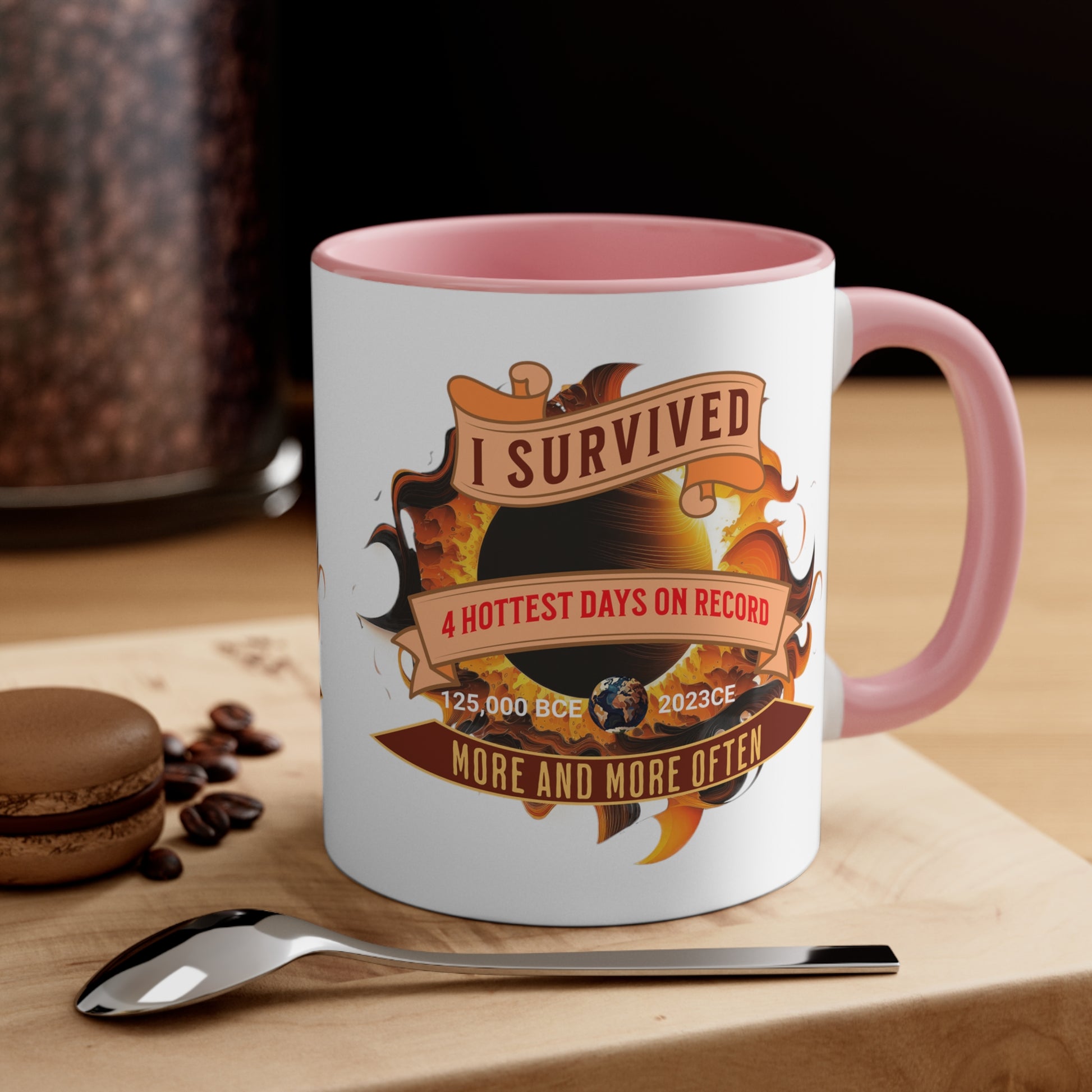 Pink interior and handle on a white mug white graphic for "I survived the four hottest days""I survived the four hottest days"