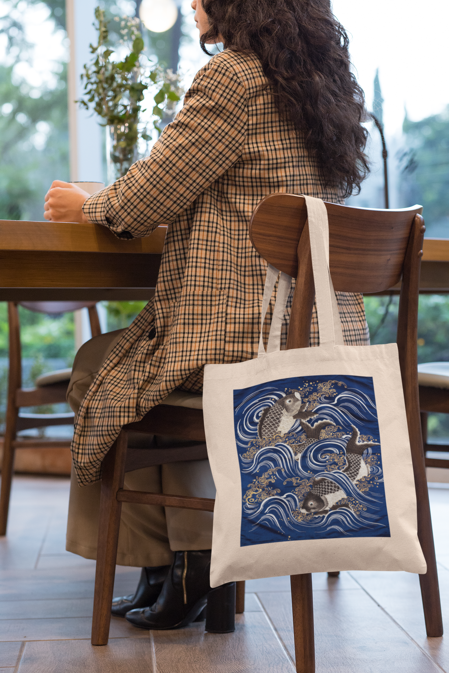 "Carp in Waves" Canvas Tote hanging on chair of woman at desk