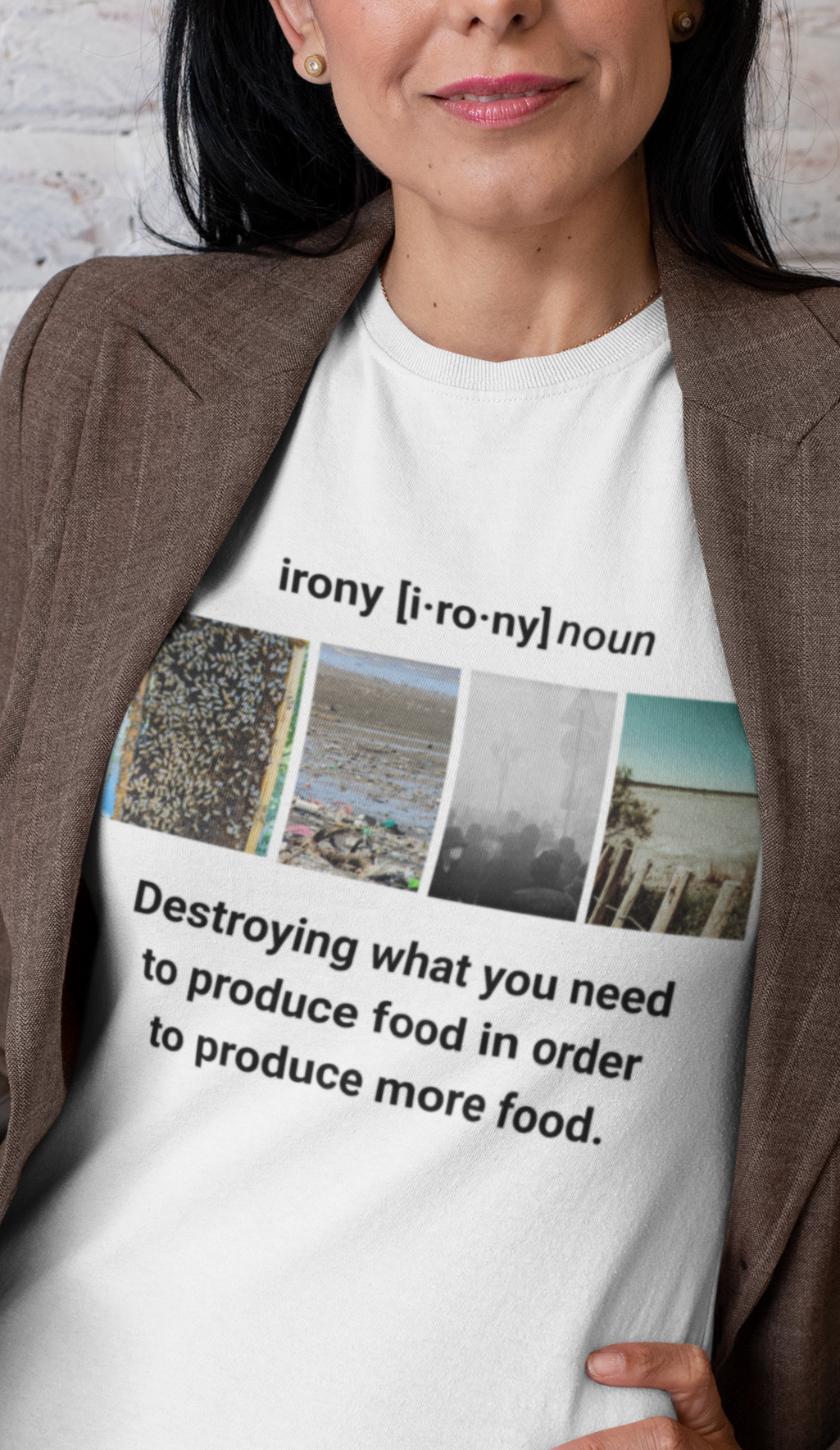 Woman in a blazer with a white tee with graphic "Irony"