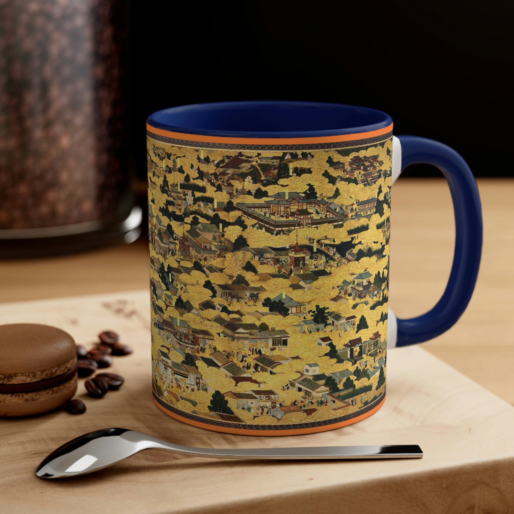 "Kyoto Map" (Vintage 17th c.) on mug with navy color inside and on handle, sitting on a wood table by a spoon and cookie