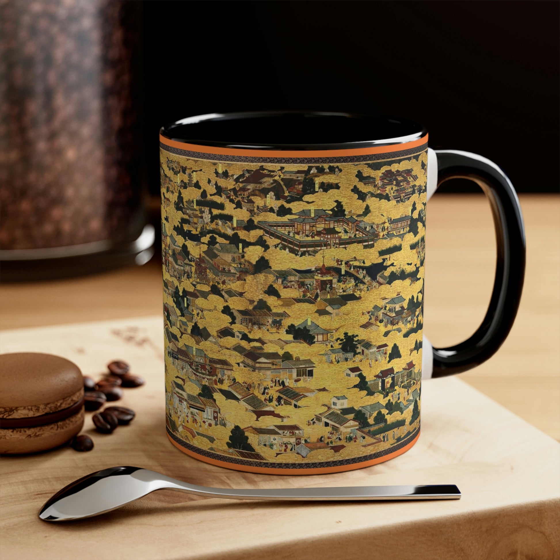 "Kyoto Map" (Vintage 17th c.) on mug with black inside and on handle, sitting on a wood table by a spoon and cookie